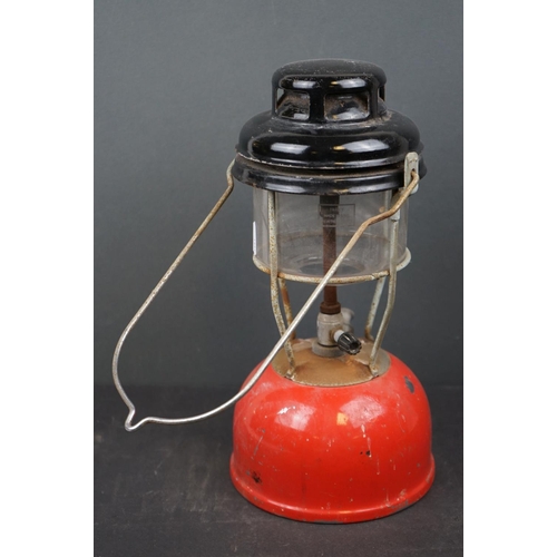 613 - A vintage storm lantern together with two vintage blow torches.