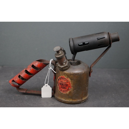 613 - A vintage storm lantern together with two vintage blow torches.