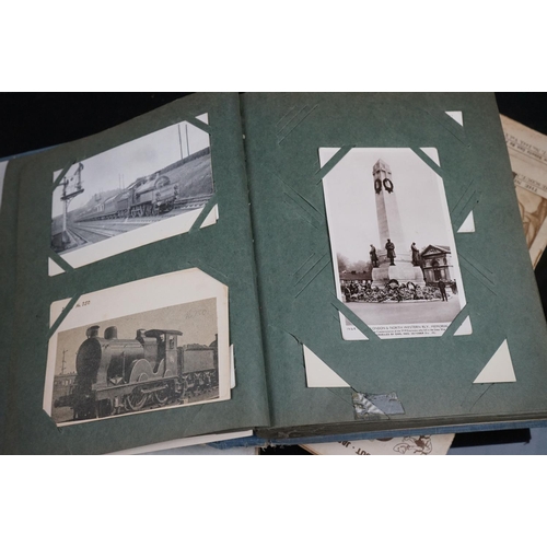 619 - A quantity of ephemera to include Railway postcards contained within albums together with a quantity... 