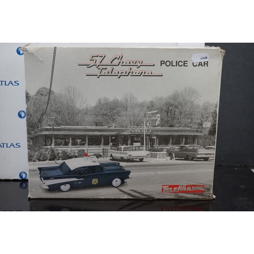 620A - A 57' Chevy police car telephone by Telemania together with an Atlas edition tank.