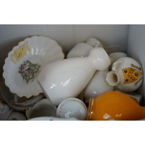 628 - A good quantity of crested china to include W.H. Goss together with a quantity of coronation ware.