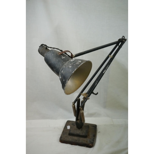 664 - Two angle poise desk lamps together with another desk lamp.