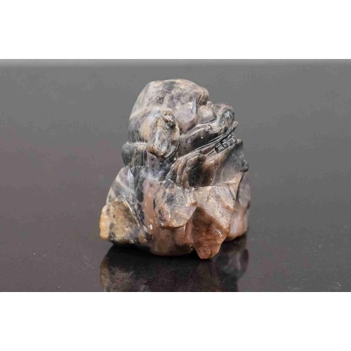 333 - A Chinese carved soapstone Foo Dog