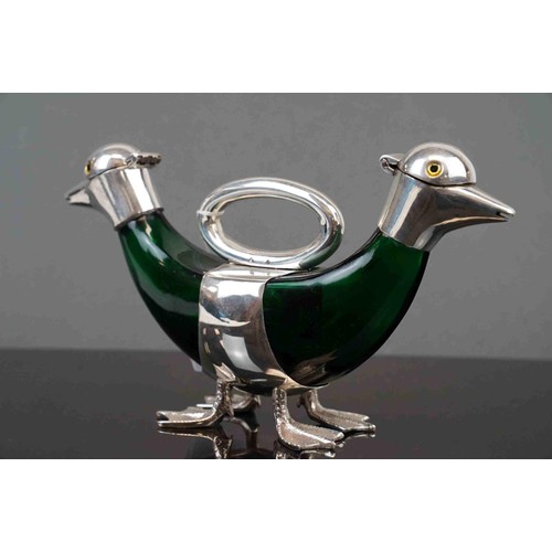 339 - Emerald coloured glass claret jug with two silver plated duck heads