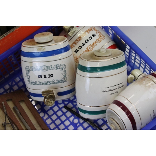 604 - A group of mixed collectables to include biscuit barrels, ceramic kegs and drawing equipment.