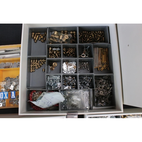 195 - Cabinet with three drawers containing a quantity of original Meccano and construction accessories, m... 