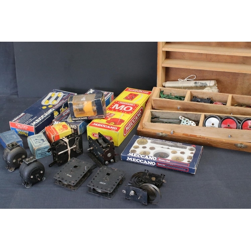 166 - Collection of Meccano items to include Clockwork and electric motors, boxed Flexible Track Pack, box... 