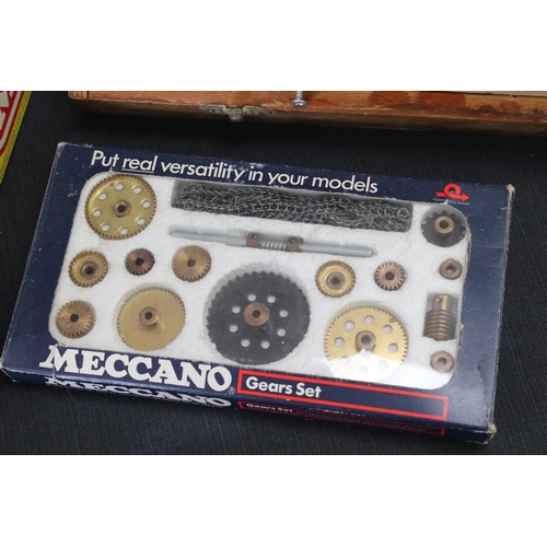 166 - Collection of Meccano items to include Clockwork and electric motors, boxed Flexible Track Pack, box... 