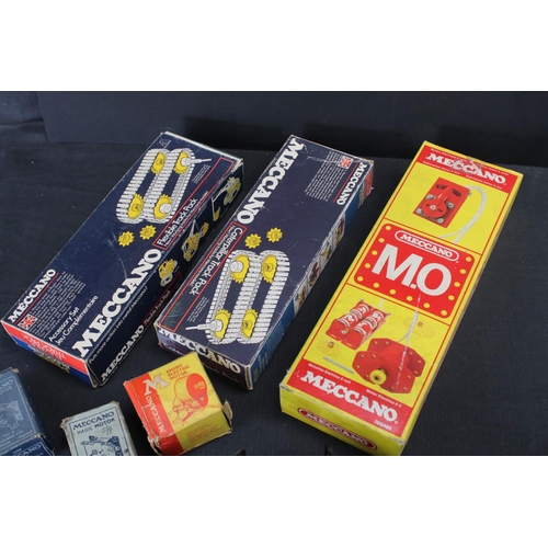 166 - Collection of Meccano items to include Clockwork and electric motors, boxed Flexible Track Pack, box... 