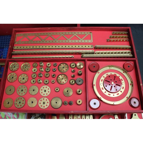 181 - Stained red mid 20th century Meccano box, with three trays, various parts and instructions for outfi... 