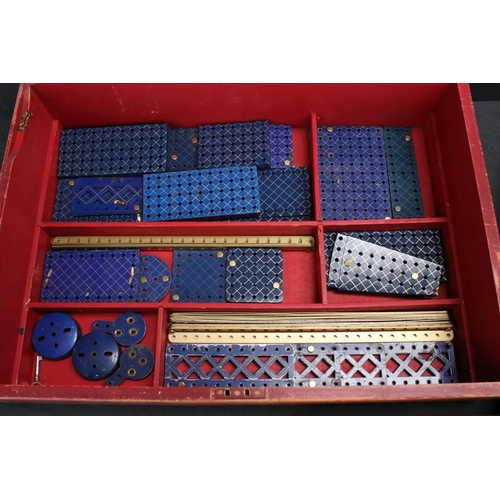 181 - Stained red mid 20th century Meccano box, with three trays, various parts and instructions for outfi... 