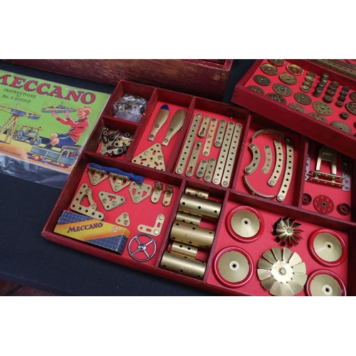 181 - Stained red mid 20th century Meccano box, with three trays, various parts and instructions for outfi... 