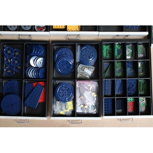 204 - Bisley ten drawer cabinet containing various Meccano accessories, items and pieces, several colours,... 