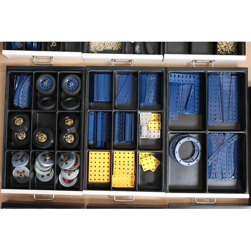 204 - Bisley ten drawer cabinet containing various Meccano accessories, items and pieces, several colours,... 