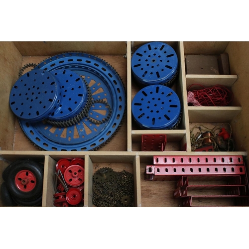 220 - Quantity of Marklin construction accessories and parts, various colours, within wooden box that has ... 