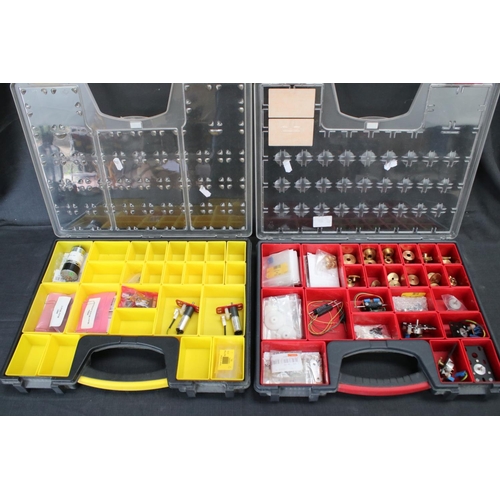 229 - Construction - Two plastic compartment tray boxes with various accessories for building to include g... 