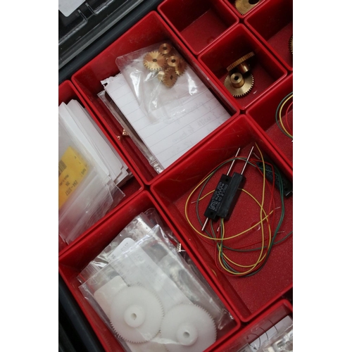 229 - Construction - Two plastic compartment tray boxes with various accessories for building to include g... 