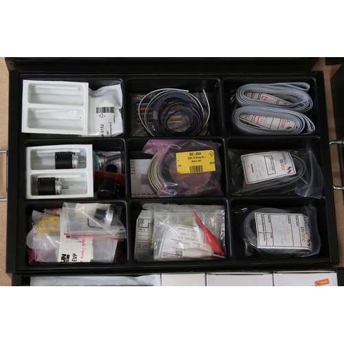 208 - Bisley ten drawer cabinet containing various small construction accessories, some unopened, also Dua... 