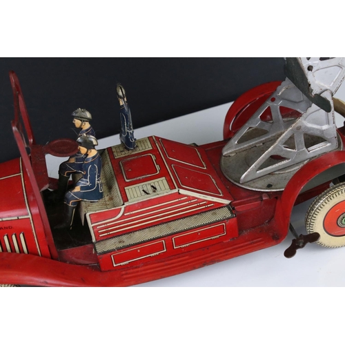 272 - Mettoy tin plate clockwork fire engine model with 3 x fireman figures, tyres marked Dunlop Fort, som... 