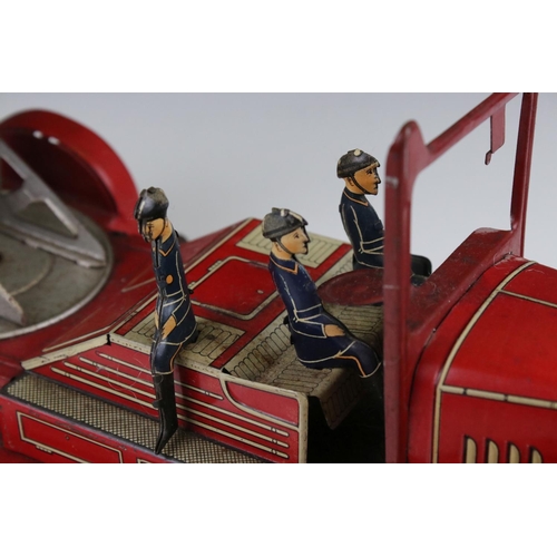 272 - Mettoy tin plate clockwork fire engine model with 3 x fireman figures, tyres marked Dunlop Fort, som... 