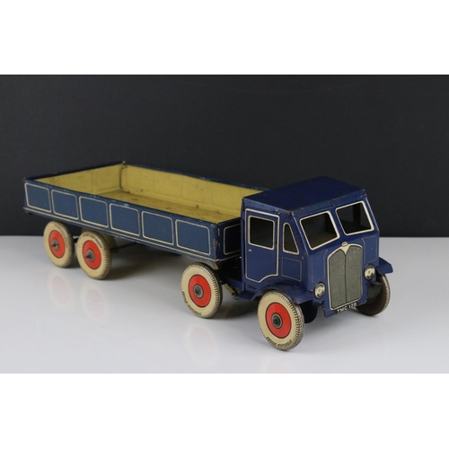 273 - Mettoy tin plate clockwork articulated lorry, the tyres marked Dunlop Fort, 42cm, some rusting, gd o... 