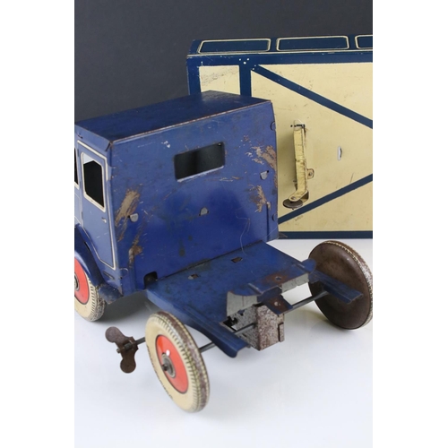 273 - Mettoy tin plate clockwork articulated lorry, the tyres marked Dunlop Fort, 42cm, some rusting, gd o... 