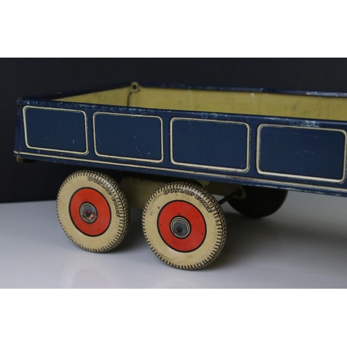 273 - Mettoy tin plate clockwork articulated lorry, the tyres marked Dunlop Fort, 42cm, some rusting, gd o... 