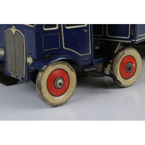 273 - Mettoy tin plate clockwork articulated lorry, the tyres marked Dunlop Fort, 42cm, some rusting, gd o... 