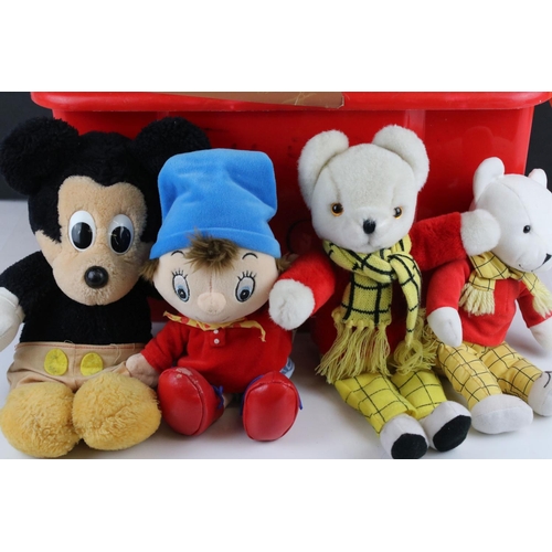 294 - A collection of soft toys to include Noddy, Mickey Mouse and Pinocchio.