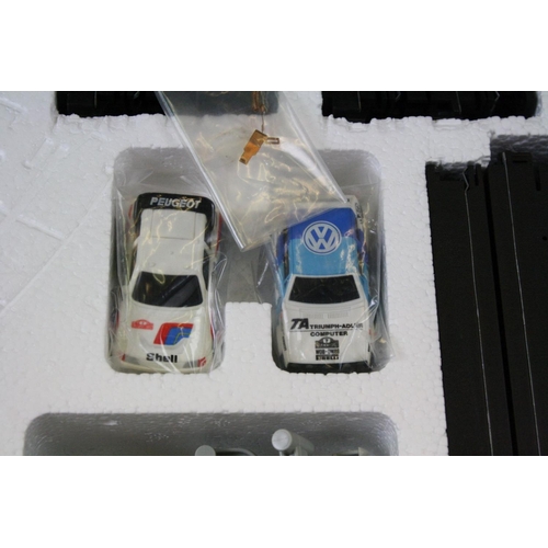 1180 - Two slot car racing sets to include Tomy Daredevil Rally and Matchbox Race & Chase together with a s... 