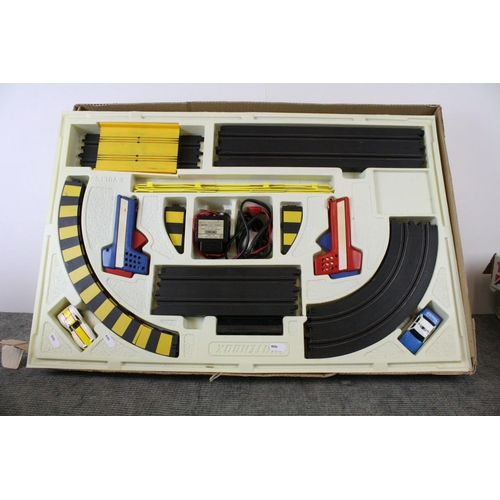 1180 - Two slot car racing sets to include Tomy Daredevil Rally and Matchbox Race & Chase together with a s... 