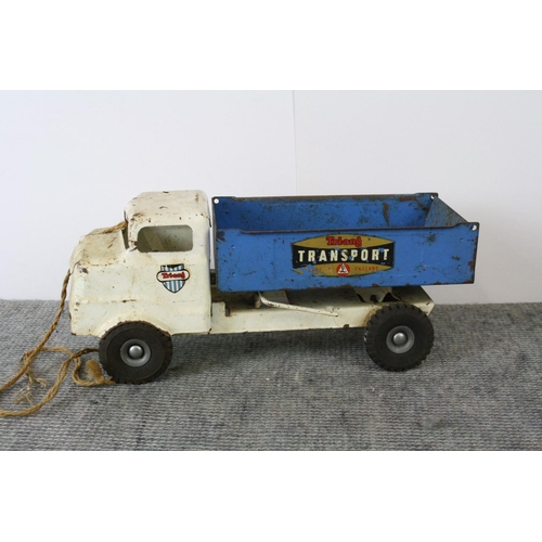 1181 - Two playworn Tri-ang tin plate toys, blue and white 'Transport' tipper truck & red crane