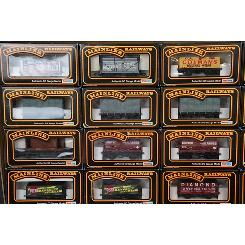 52 - 40 Boxed Mainline Railways OO gauge items of rolling stock, featuring all wagons and vans, to includ... 