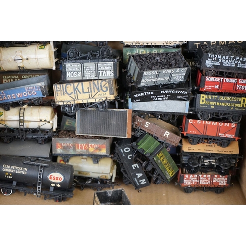 79 - Around 70 OO gauge items of rolling stock to include kit built, Peco etc, a few missing wheels