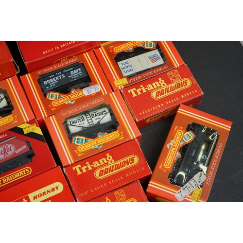 90 - 36 Boxed Hornby Triang OO gauge items of rolling stock to include coaches, vans and wagons featuring... 