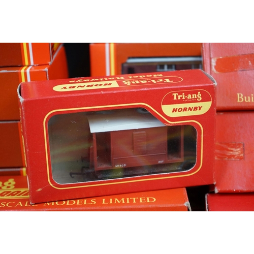 90 - 36 Boxed Hornby Triang OO gauge items of rolling stock to include coaches, vans and wagons featuring... 