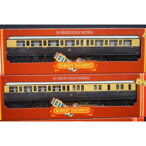 90 - 36 Boxed Hornby Triang OO gauge items of rolling stock to include coaches, vans and wagons featuring... 