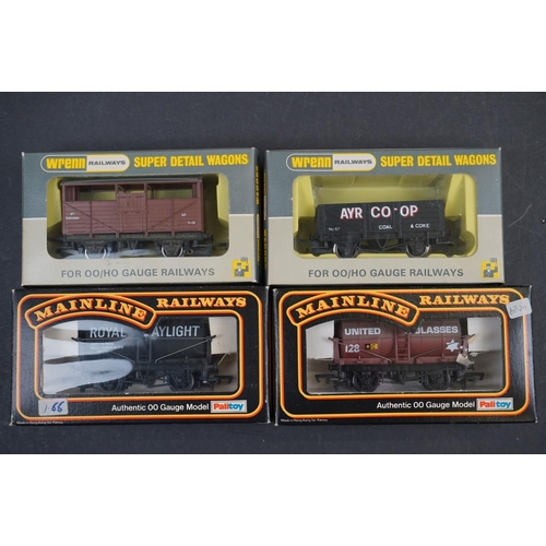 102 - 31 Boxed OO gauge items of rolling stock to include 19 x Hornby, Wrenn x 2, Bachmann x 3, Mainline x... 