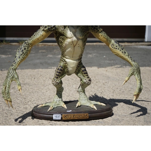 1037 - Neca Gremlins 2 Mohawk Gremlin statue, made of resin and measuring 28 inches, damage to spines on ba... 