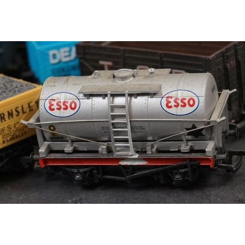 108 - 26 OO gauge items of rolling stock, featuring wagons, vans and tankers, featuring Hornby, Triang etc