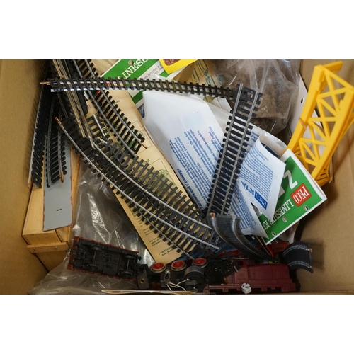 148 - Quantity of OO/N gauge model railway accessories to include track, spares and repairs, rolling stock... 