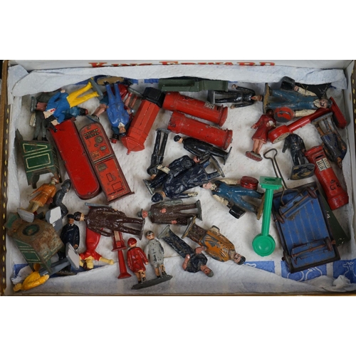 238 - A collection of mainly Britains lead Railway related figures and accessories to include benches, tic... 