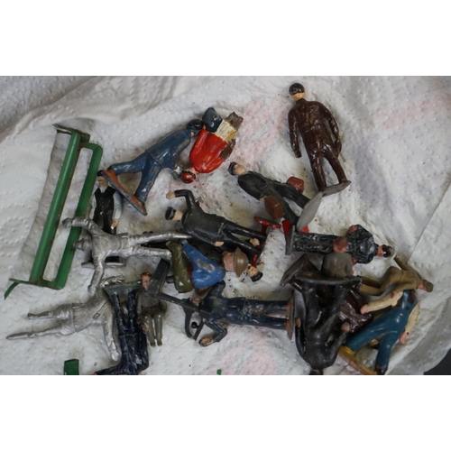 238 - A collection of mainly Britains lead Railway related figures and accessories to include benches, tic... 