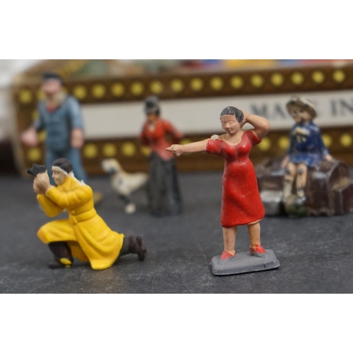 238 - A collection of mainly Britains lead Railway related figures and accessories to include benches, tic... 