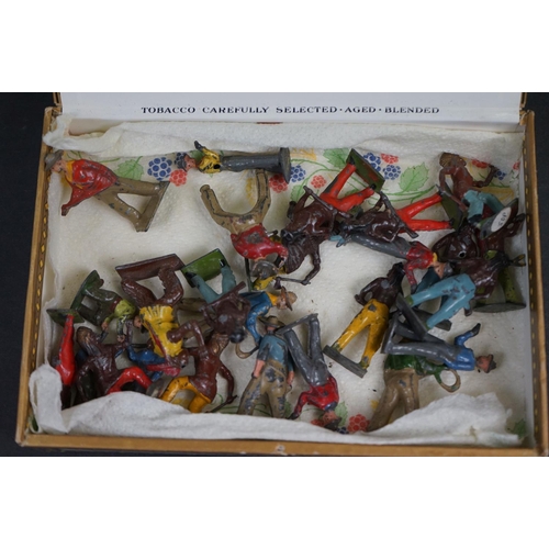 241 - A collection of approx 30 x Britains lead Cowboy and Indian figures.