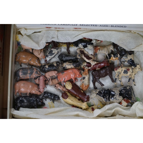 246 - A large collection of mainly Britains lead farm animals to include horses, cows, pigs, sheep and chi... 