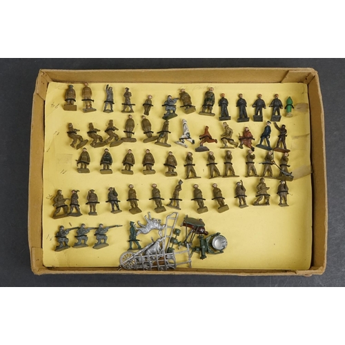 258 - Over 50 small scale mid 20th C painted metal  military figures to include Skybirds and Dinky plus un... 