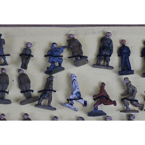 258 - Over 50 small scale mid 20th C painted metal  military figures to include Skybirds and Dinky plus un... 