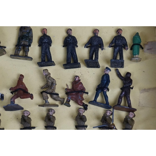 258 - Over 50 small scale mid 20th C painted metal  military figures to include Skybirds and Dinky plus un... 