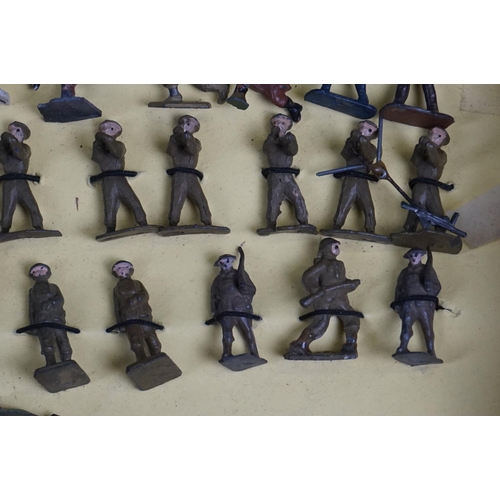 258 - Over 50 small scale mid 20th C painted metal  military figures to include Skybirds and Dinky plus un... 